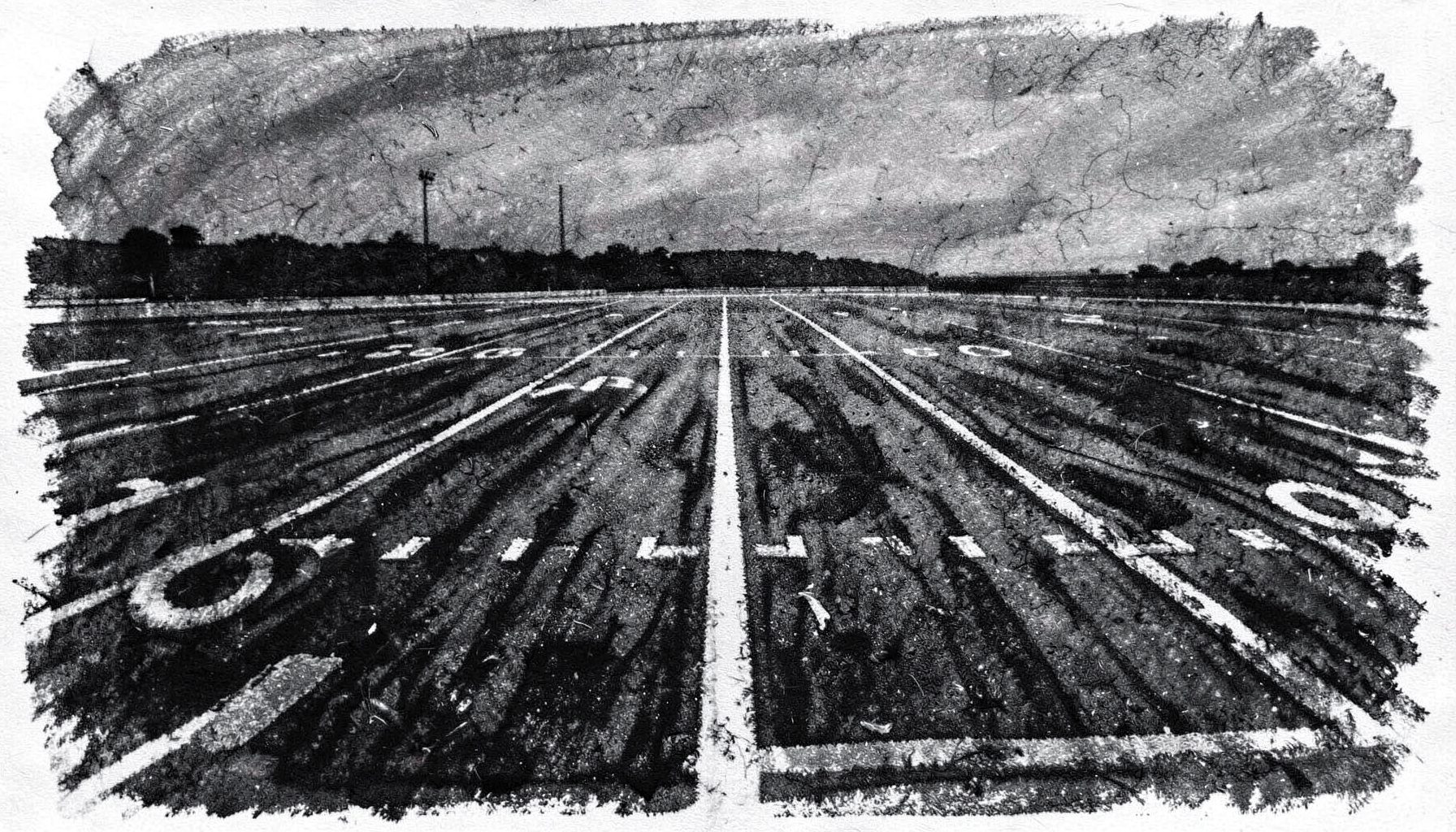 A bold charcoal sketch of a football field with yard lines stretching toward a dim horizon in shades of black and slate gray.